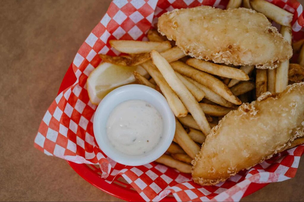 Enjoy good ol’ fish n’ chips and beer at The Drunken Poet